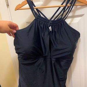 Free** with purchase over $25 swimsuit top 3x